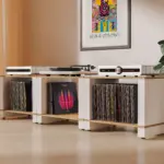 The Blok Stax 2G LP Collection in a row of three, holding records beneath a turntable and electronics